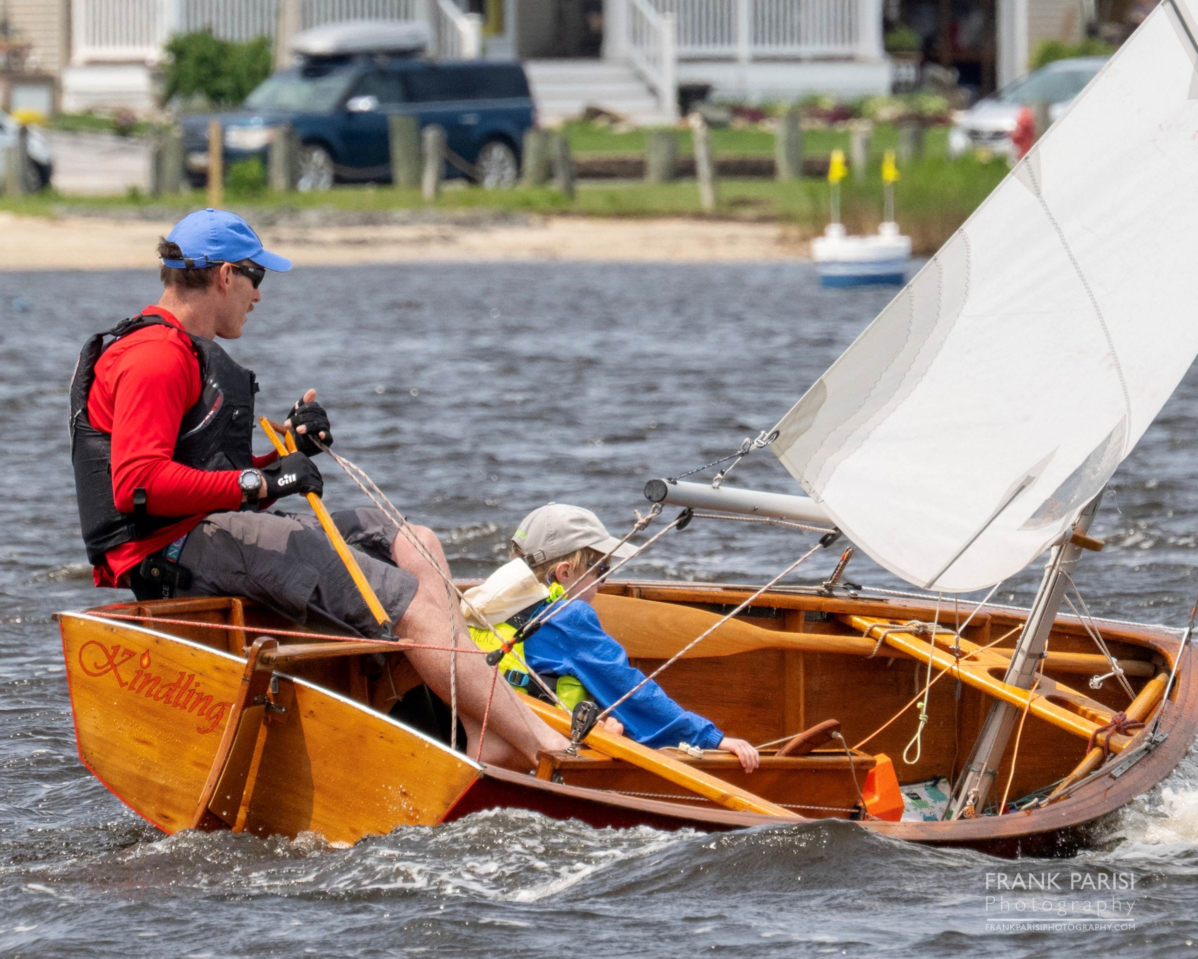 A person and child in a small boat

AI-generated content may be incorrect.